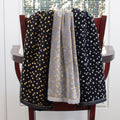 black and grey with gold  dots