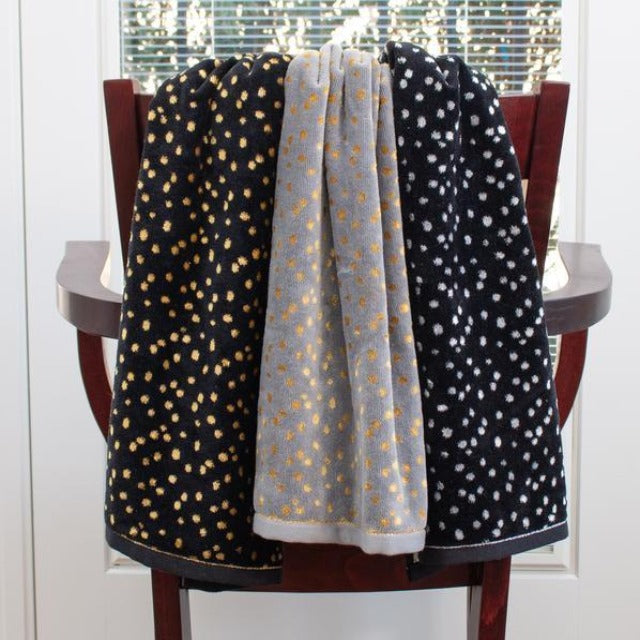 black and grey with gold  dots